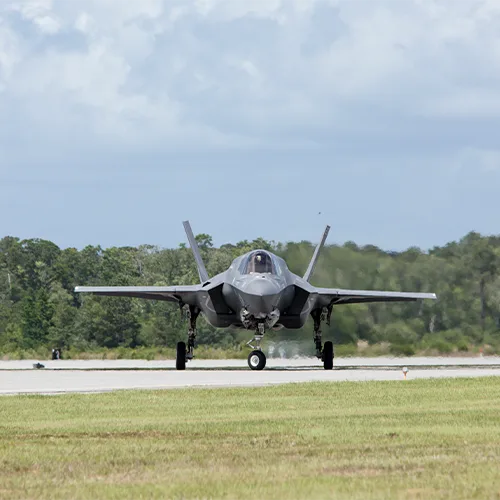 Panama City, FL Engineering image of a stealth fighter jet taxiing on a runway